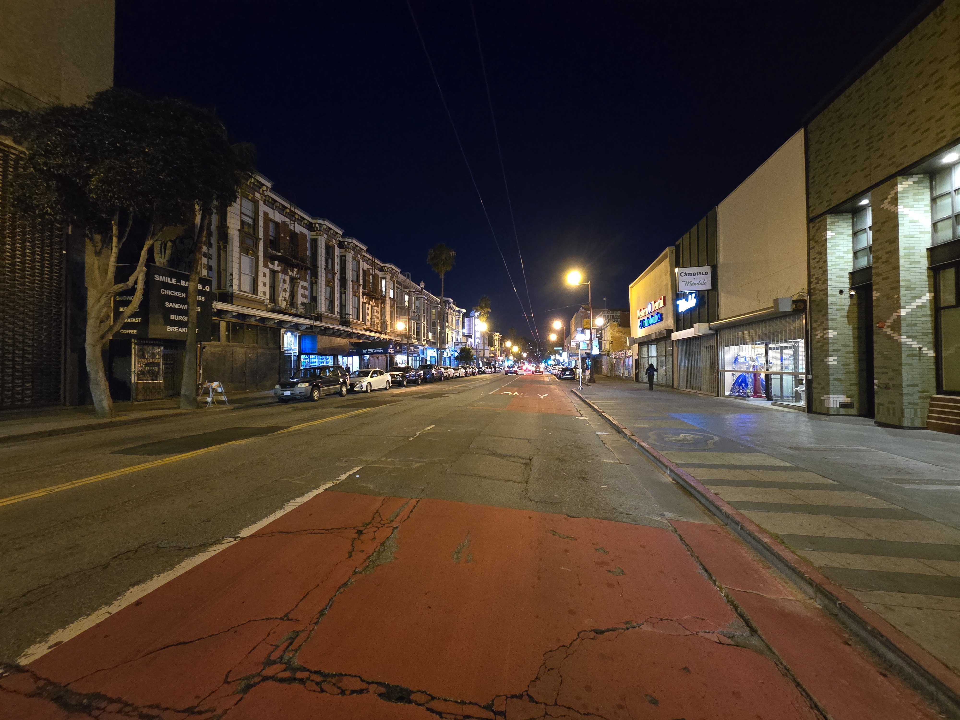 Mission Street at night showing improved lighting along the corridor