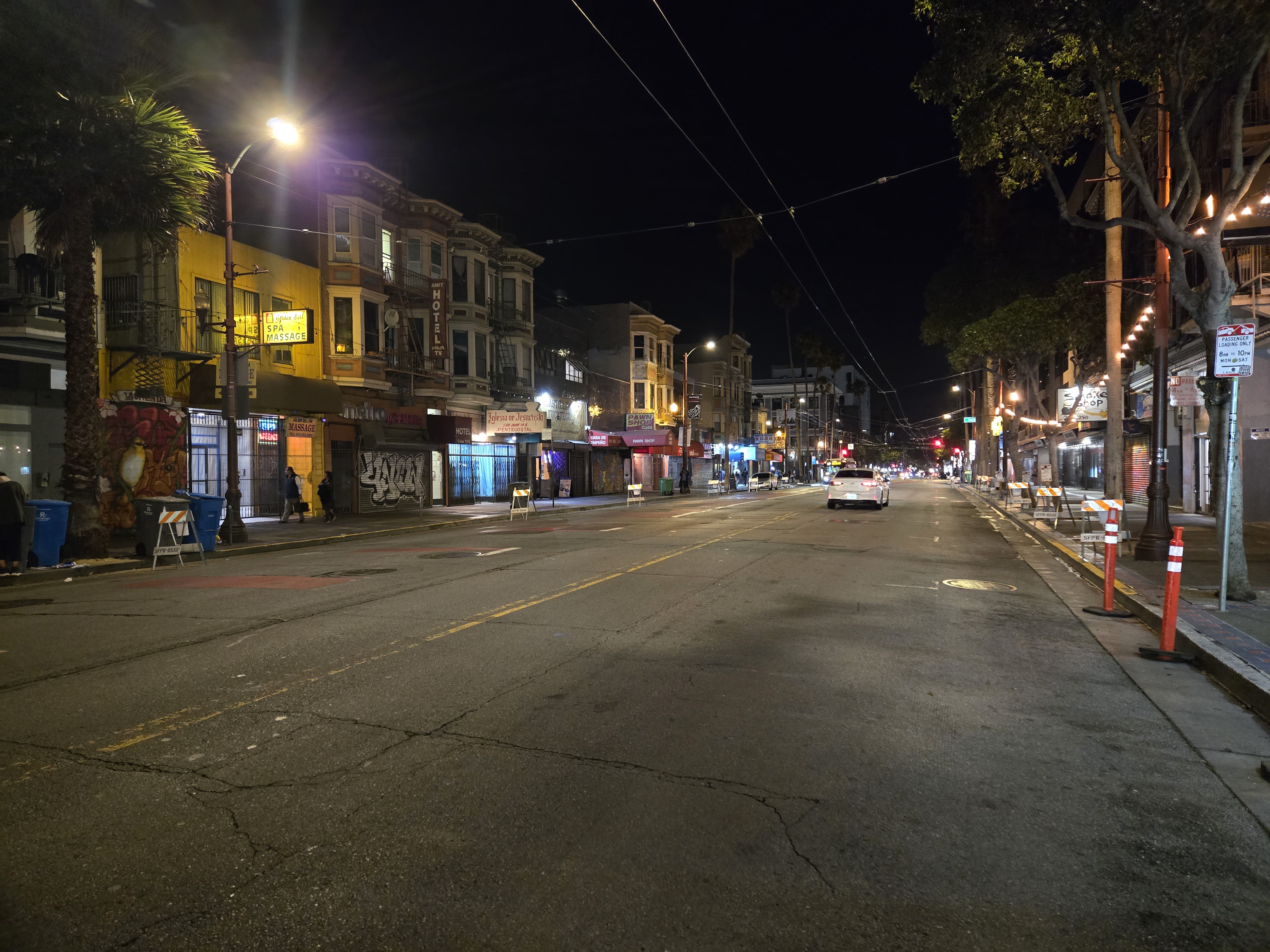 Mission Street corridor with upgraded streetlights illuminating both sides